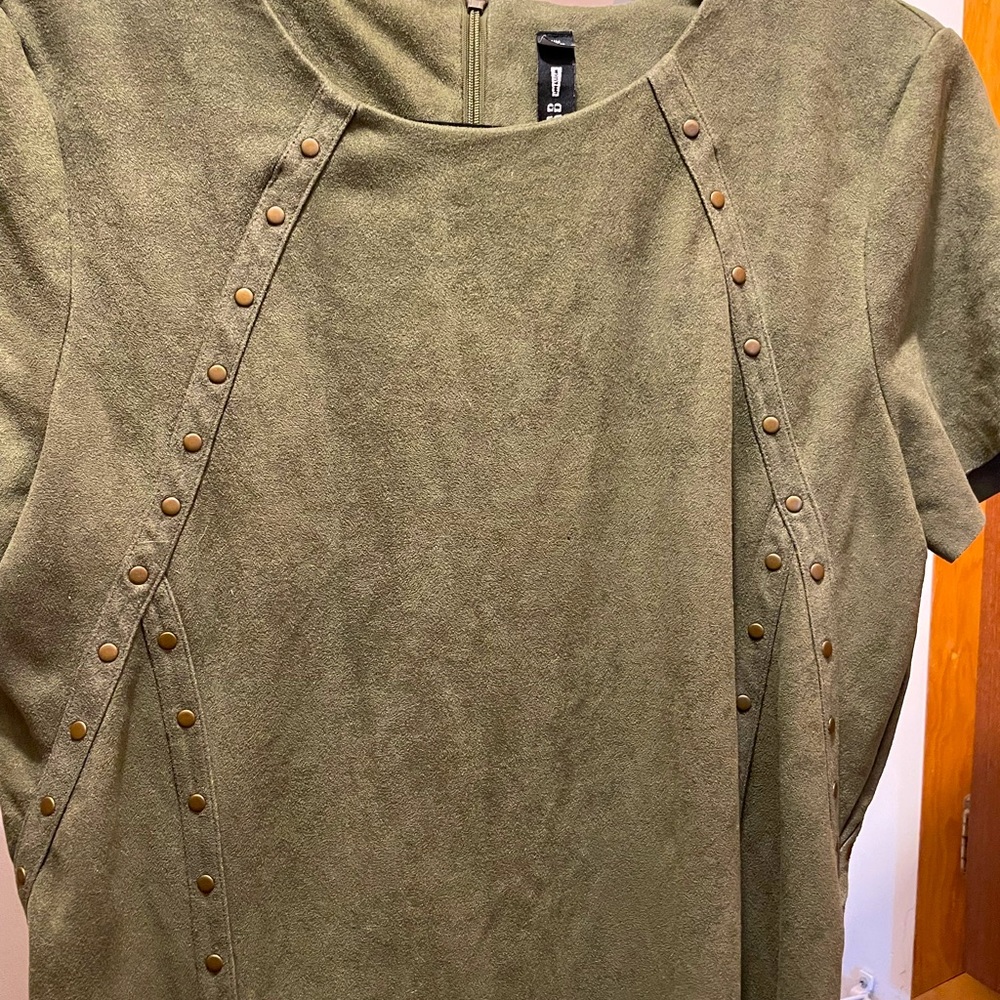 Faux suede look. Raw edge hemline.